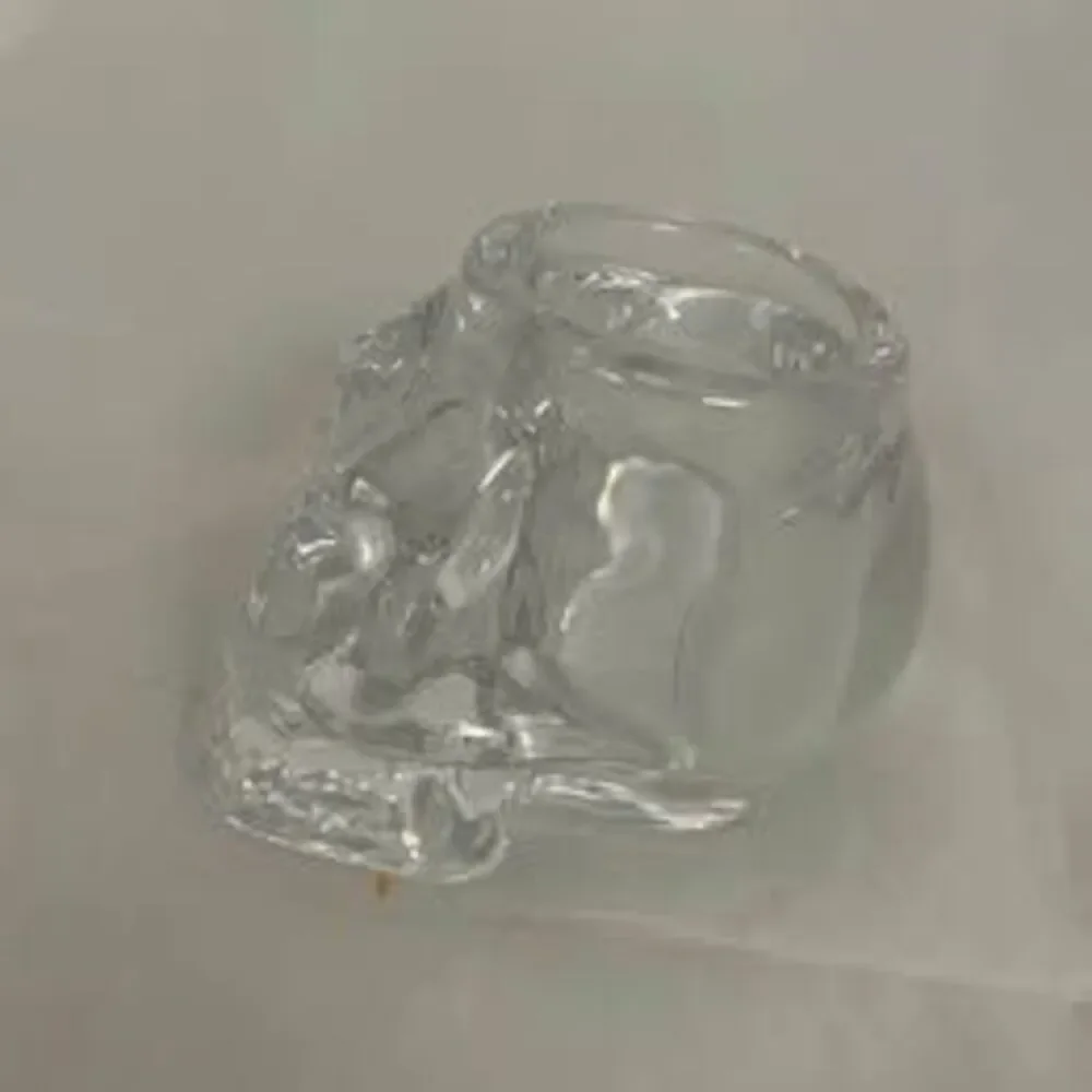 Glass skull candle holder